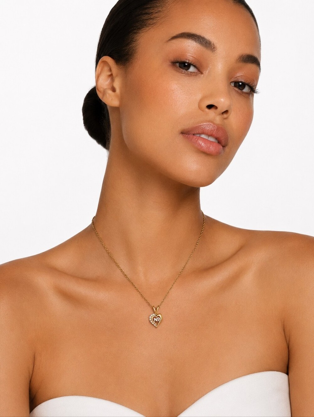 Nina Ricci Gold Tone Heart Pendant Necklace